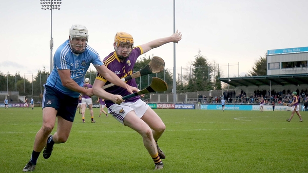 Dublin's Alan Moore (L) battles with Simon Donohoe at Parnell Park