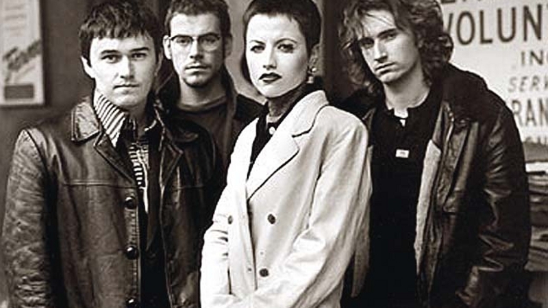 Dolores pictured with The Cranberries around the time of Zombie's original release in 1994