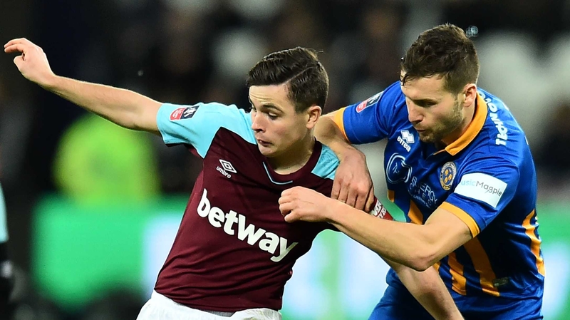 Josh Cullen (L) in action against Shrewsbury
