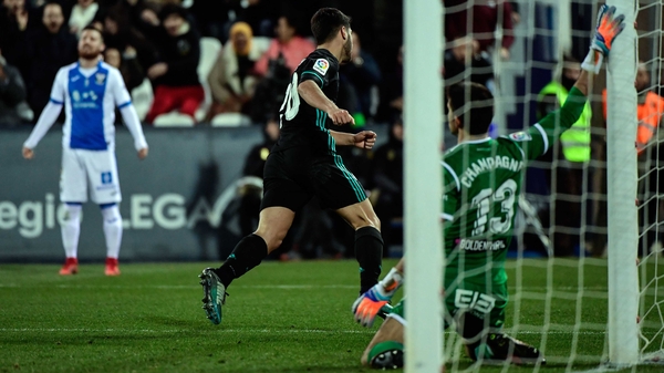 Marco Asensio wheels away in celebration