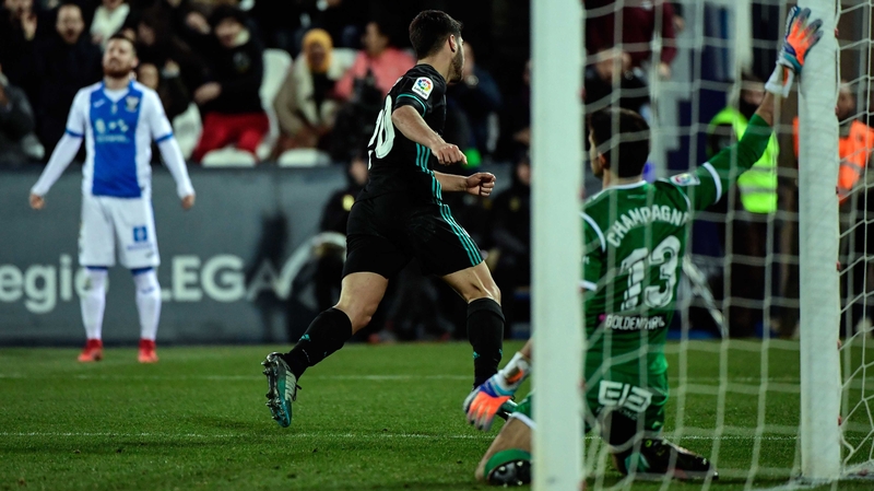 Marco Asensio wheels away in celebration