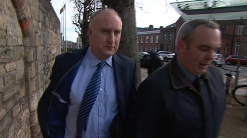 Garda Fergal O'Flaherty (left) said he recognised one of the people in the photograph as Patrick Hutch