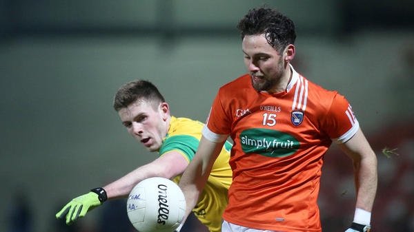 Armagh's Oisin MacIomhair and Eoghan Ban Gallagher of Donegal