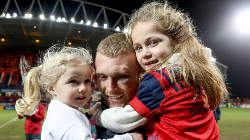 Munster's Keith Earls celebrates after the game with his daughters Ella May and Laurie