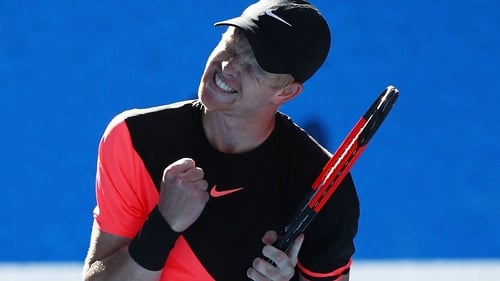Kyle Edmund celebrates after winning the match