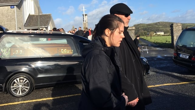 Don Burton (Dolores O'Riordan's ex-husband) and their daughter Molly following the funeral mass