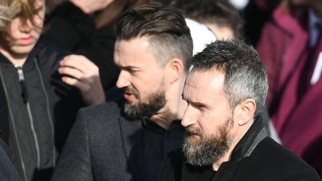 The Cranberries band members, Mike Hogan (C) and Noel Hogan (R) were among the mourners