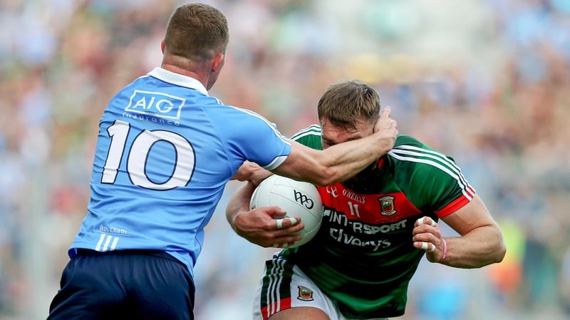 Dublin's Ciaran Kilkenny tangles with Mayo's Aidan O'Shea in the 2017 All-Ireland SFC final