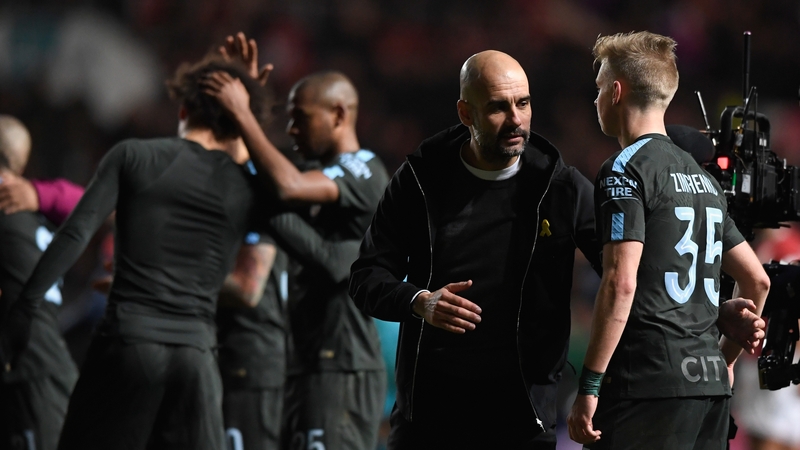 Pep Guardiola congratulates his players following the Carabao Cup semi-final victory over Bristol City