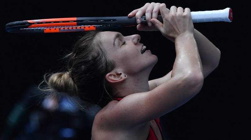 Simona Halep celebrates beating Angelique Kerber
