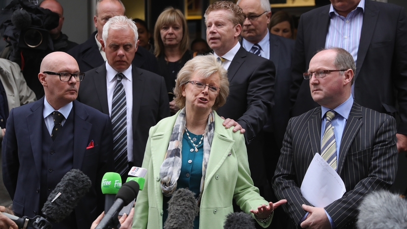 Julie Hambleton (centre) and the relatives of those killed want to find out who planted the bombs