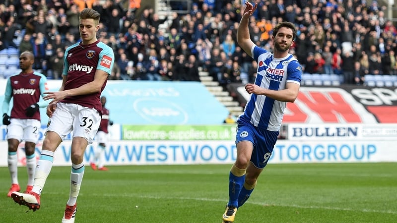 Will Grigg celebrates his opening goal against West Ham