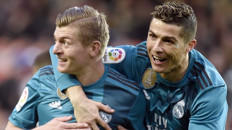 Toni Kroos (L) celebrates with Cristiano Ronaldo
