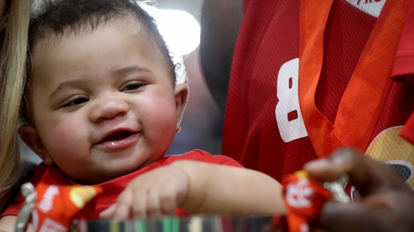 Michael Junior gets his hands on the cup