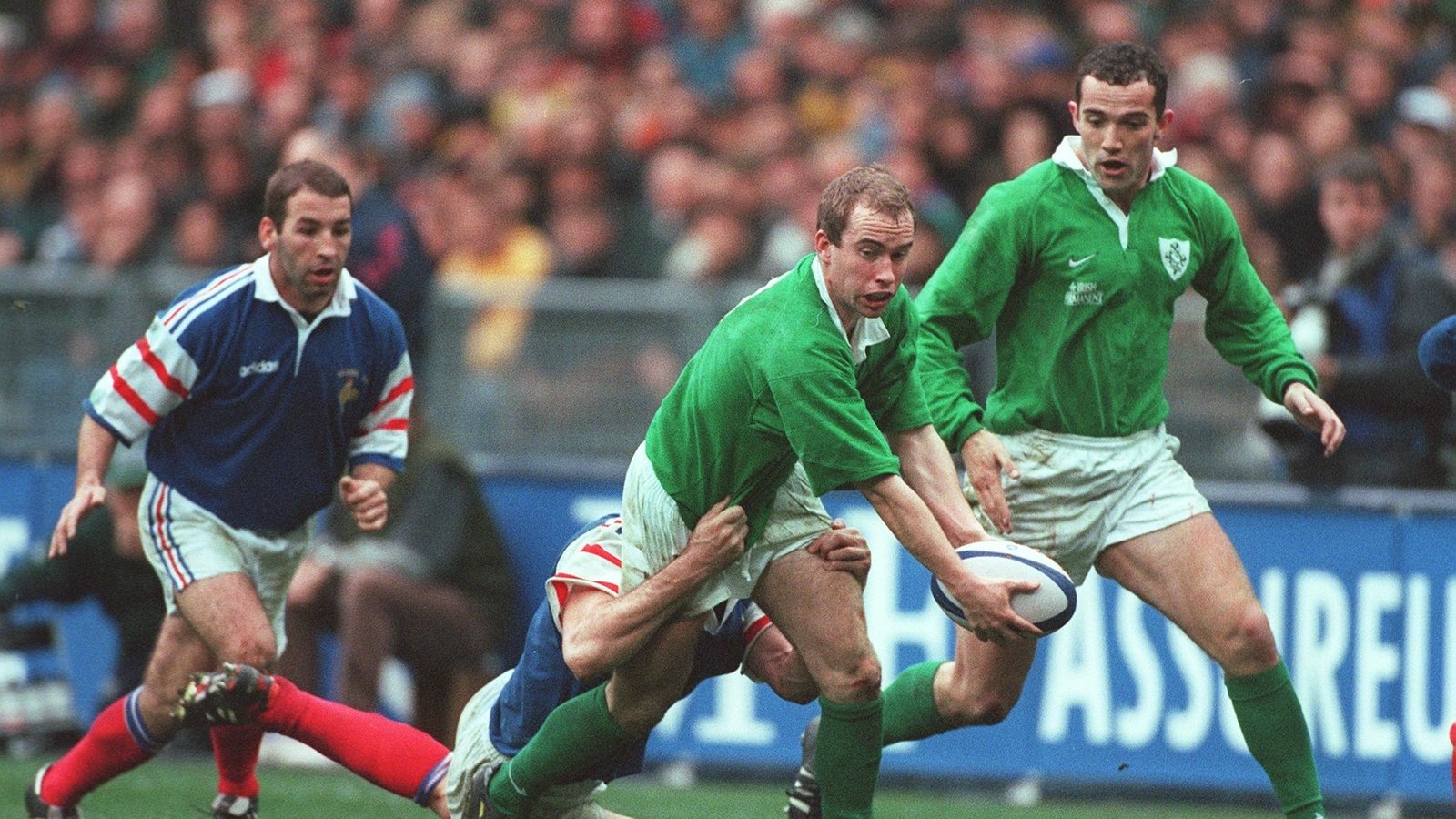 Scrum half Conor McGuinness and full-back Conor O'Shea in action in Paris in 1998.