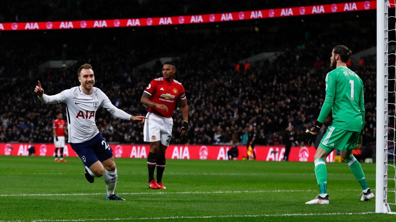 Christian Eriksen celebrates the opening goal at Wembley