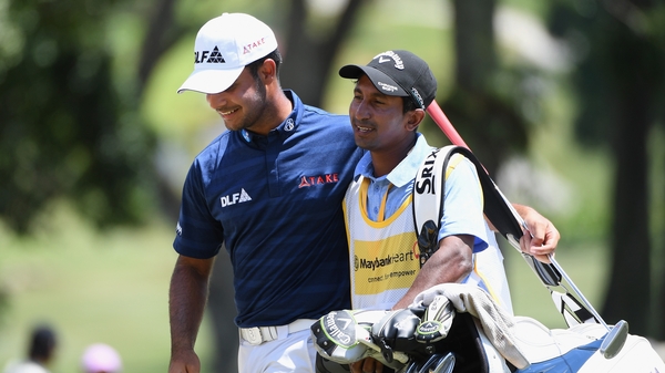 Shubhankar Sharma celebrates with his caddy