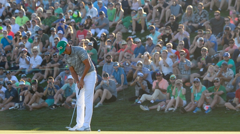 Fowler watching his birdie putt on the 18th on Saturday