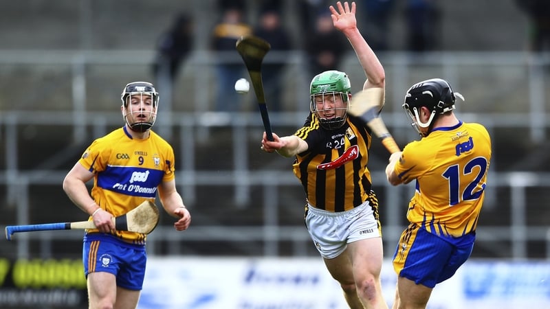 Martin Keoghan attempts to block down David Reidy