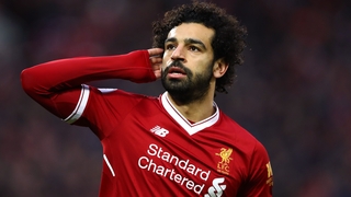 Mo Salah salutes the crowd after opening the scoring against Spurs