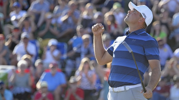 Gary Woodland sinks the crucial putt