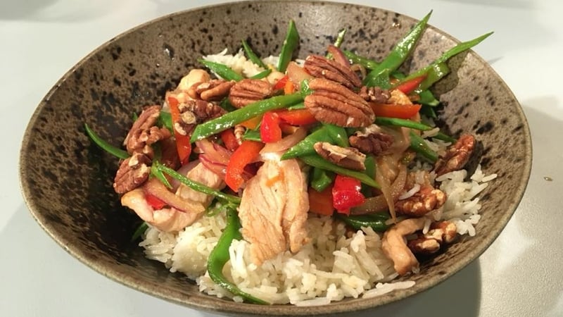 Kevin Dundon's Pork and Chicken Stir Fry with Roasted Curried Nuts.