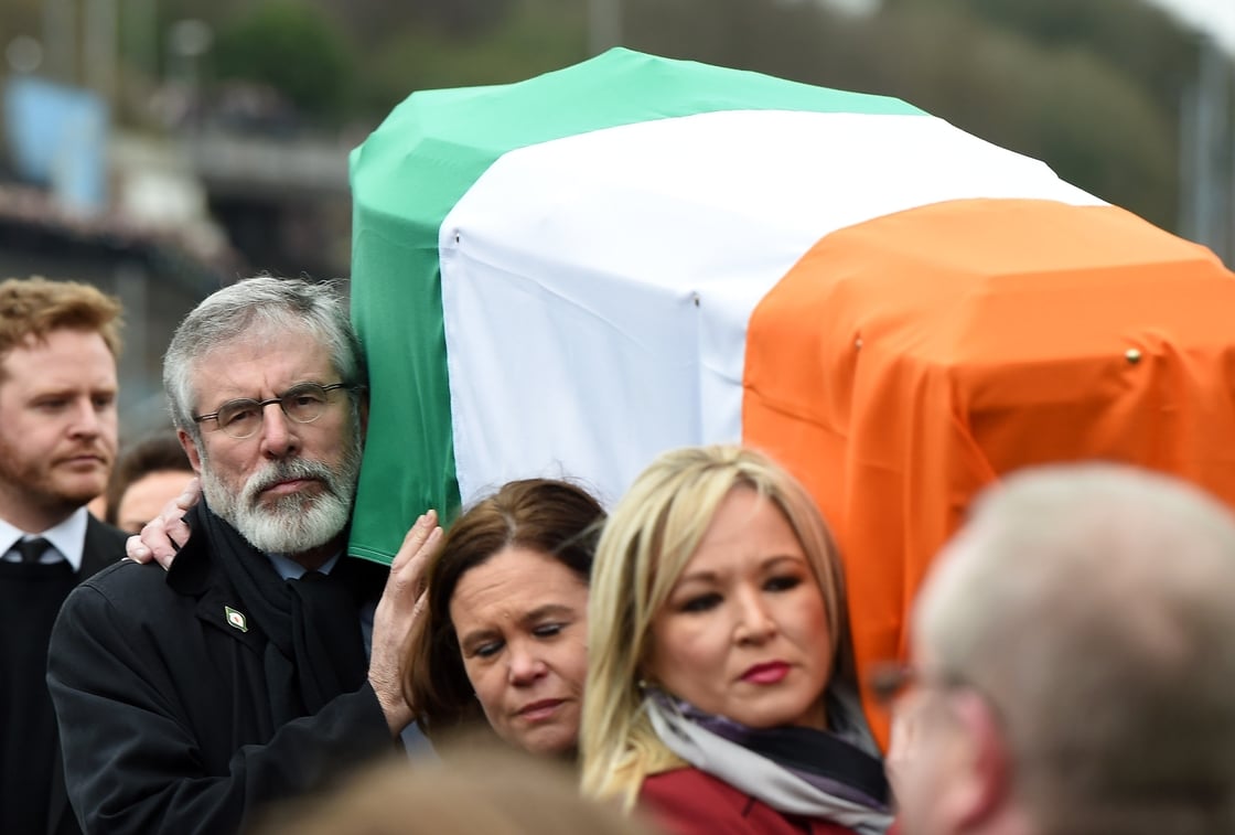 Gerry Adams carries the coffin at Martin McGuinness' funeral