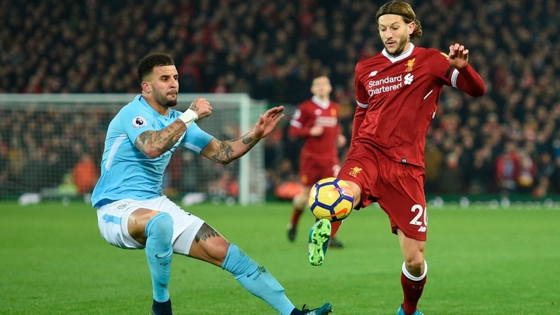 Adam Lallana (R) came on as a sub against Manchester City