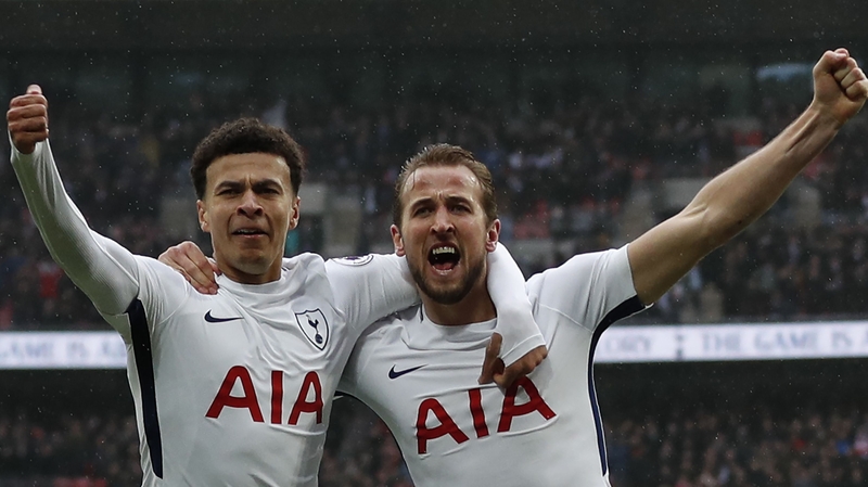 Dele Alli (L) celebrates with Harry Kane