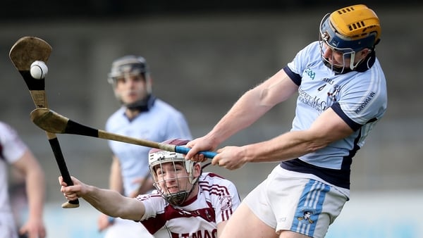 Niall Buckley is blocked by Conor McAllister