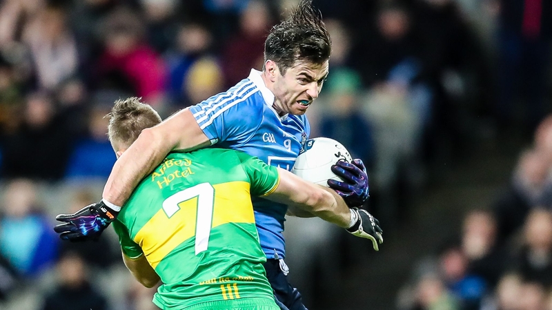 Dublin's Michael Darragh Macauley battles with Tony McClenaghan