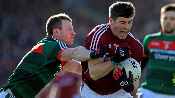 Mayo's Colm Boyle tackles Shane Walsh of Galway
