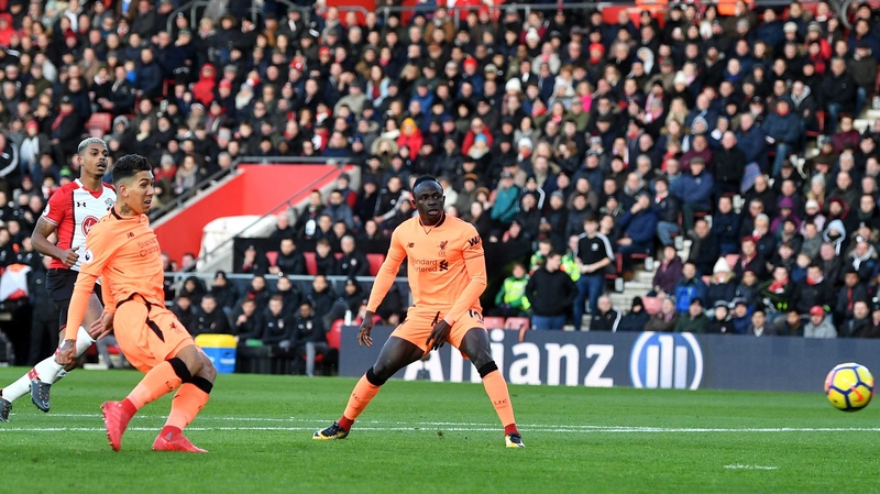Roberto Firmino scoring the opening goal