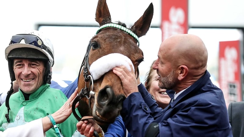 Davy Russell (L) and owner Philip Reynolds celebrate his victory aboard Presenting Percy at last year's Cheltenham Festival