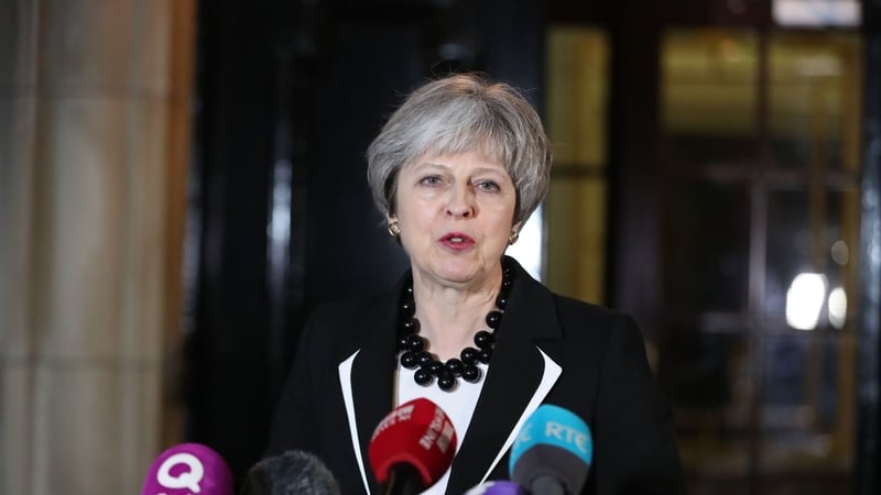 British Prime Minister Theresa May speaking to reporters at Stormont this evening