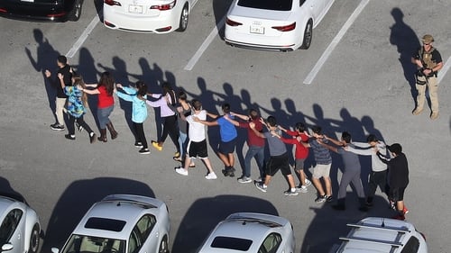 Students hid in classrooms until they were rescued by police, according to friends and family members