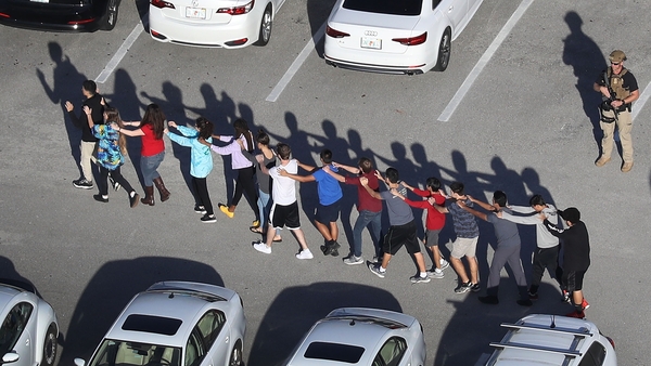 Students hid in classrooms until they were rescued by police, according to friends and family members
