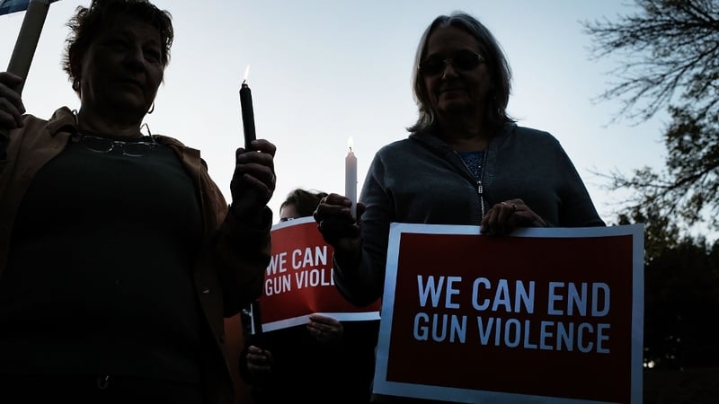 People in Newtown, Connecticut, take part in a vigil against gun violence