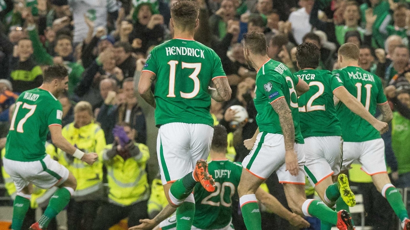 Ireland players celebrate with Shane Duffy after his goal against Denmark in the World Cup play-off at the Aviva Stadium