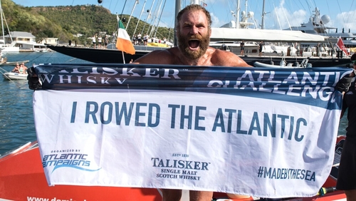 Damian Browne celebrates arriving in Antigua, 64 days after setting off from the Canary Islands