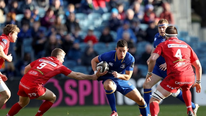 Leinster's Noel Reid with Jonathan Evans and Steve Cummins of Scarlets