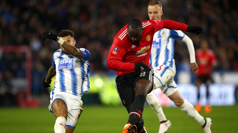 Romelu Lukaku slots home United's second goal