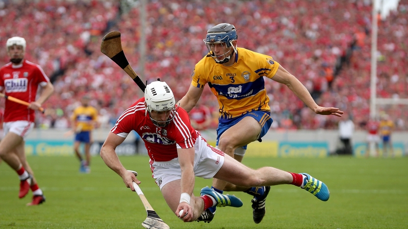 Clare's David McInerney and Cork's Patrick Horgan battle for possession in the 2017 Munster Championship clash