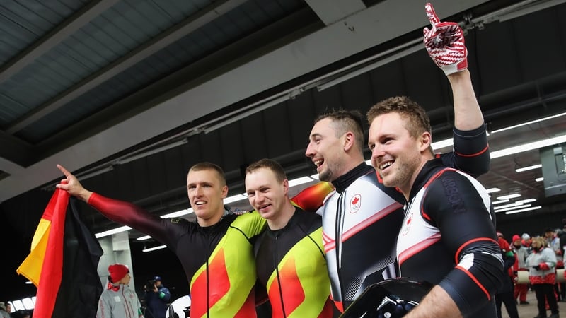 Germany and Canada celebrate their shared gold medals
