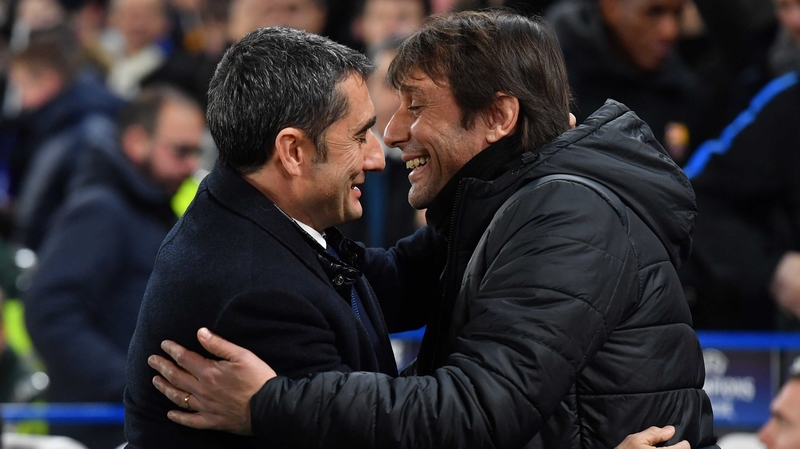 Chelsea's Antonio Conte greets Barcelona boss Ernesto Valverde