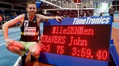 John Travers celebrates his achievement