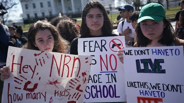 Students protesting outside the White House in Washington DC after the shootings in Florida. Photo: Getty Images