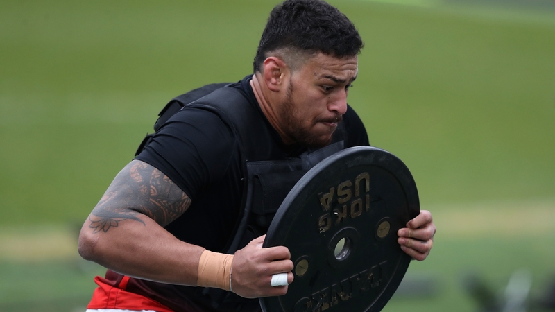 Hughes shows his strength in training