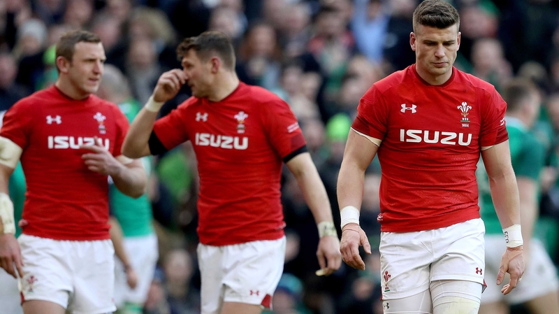 Wales' Scott Williams (R) cuts a dejected figure at the full-time whistle