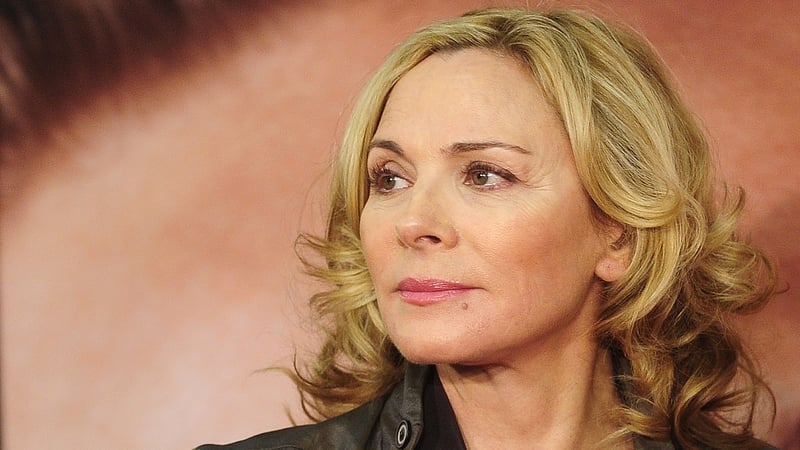 Kim Cattrall lit a candle in memory of her brother while visiting St Cuthbert's Church in Edinburgh